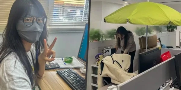 Ofis yaşlanmasına karşı: Çinli çalışanlar masada şemsiye açıyor
